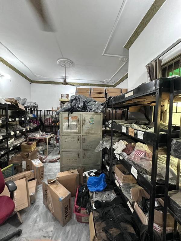 Hardware and material storage shelving at the PrimeCraft Partners facility in Sialkot